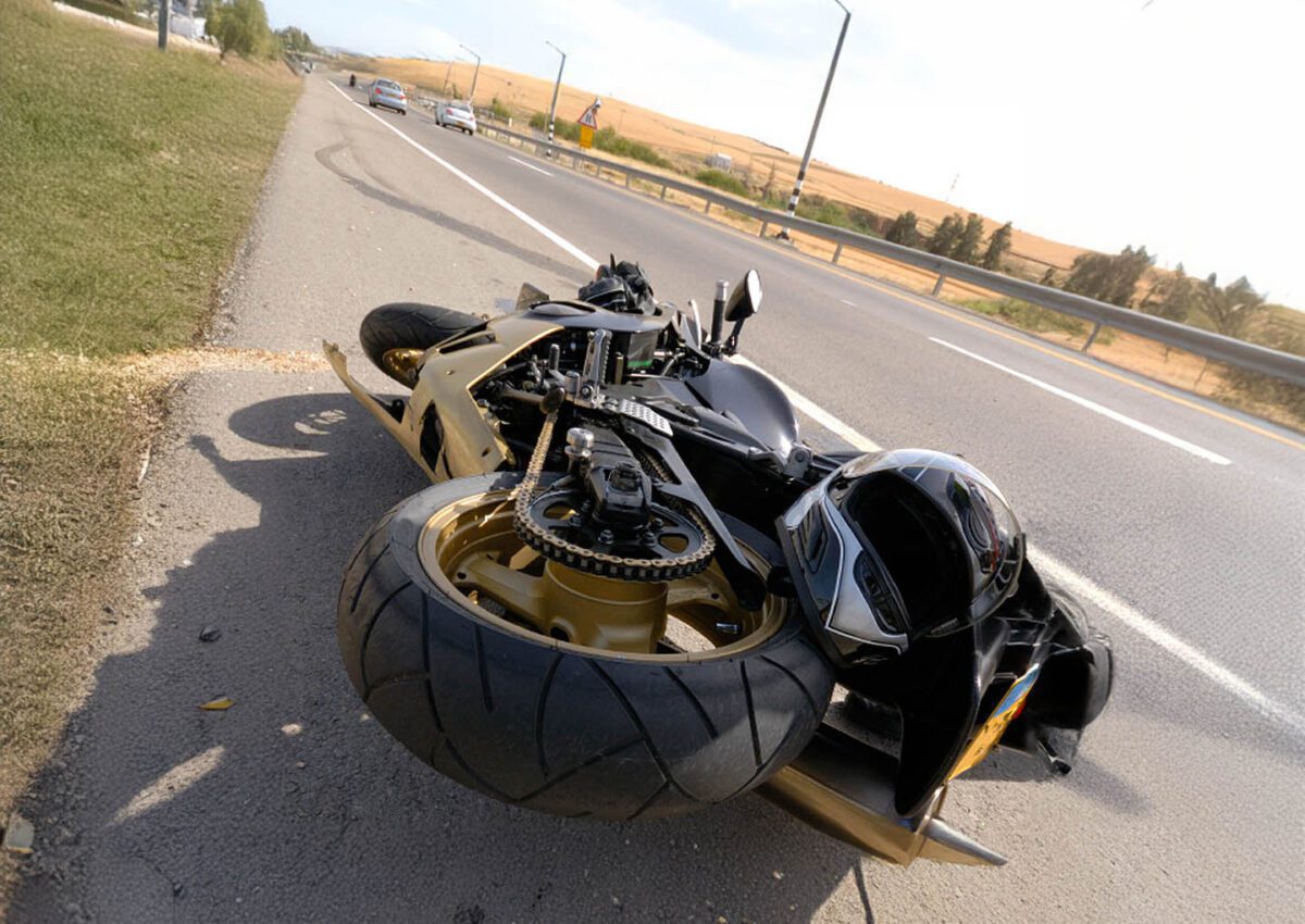 motorcycle crashed on roadway