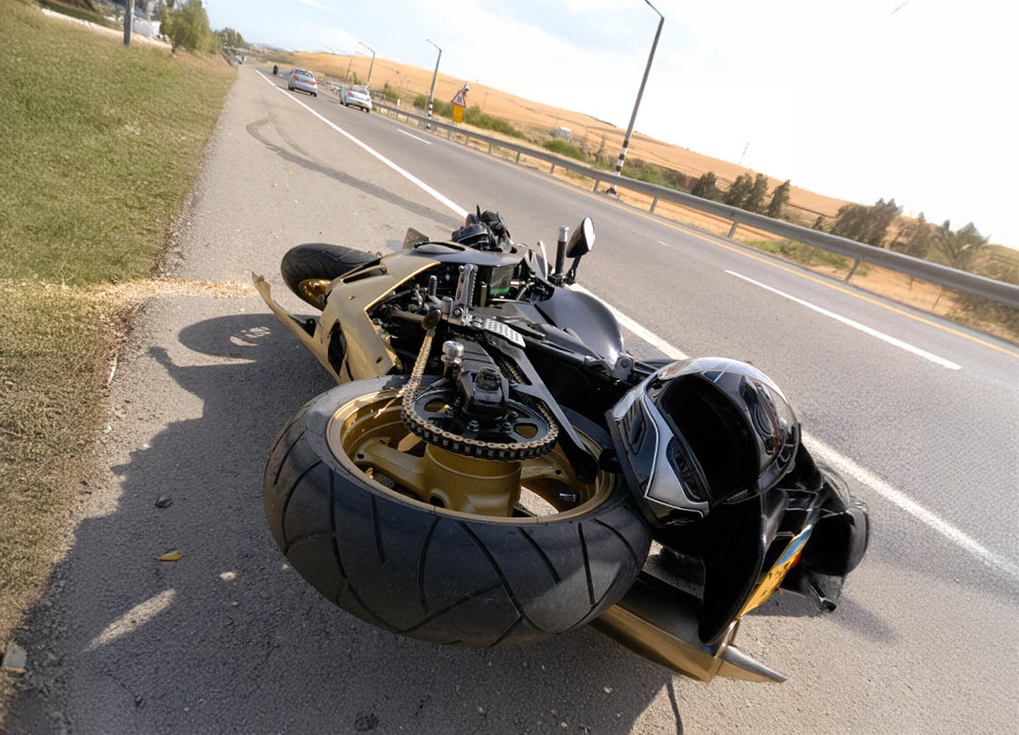 motorcycle crashed on roadway