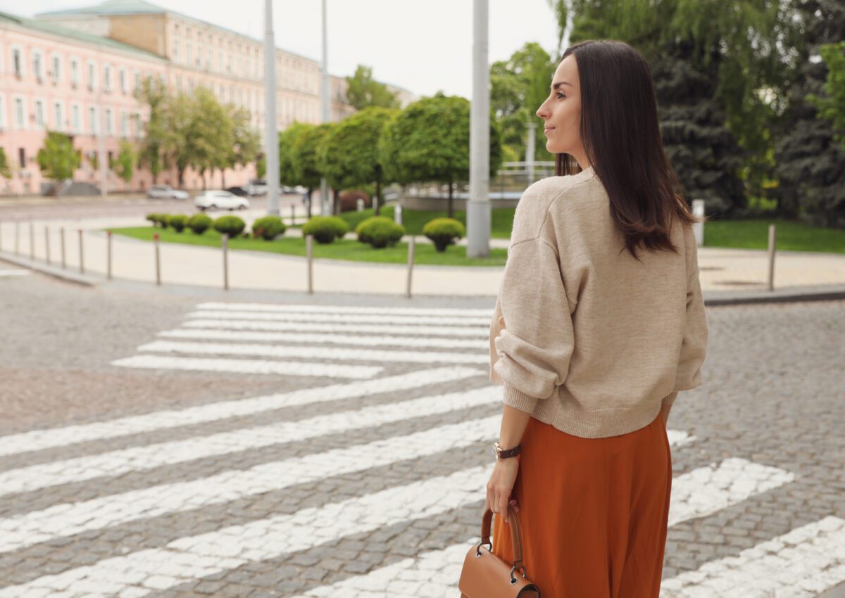 woman crossing street.